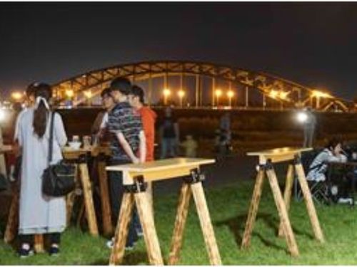 旭川のシンボル旭橋をバックにカクテルイベント！