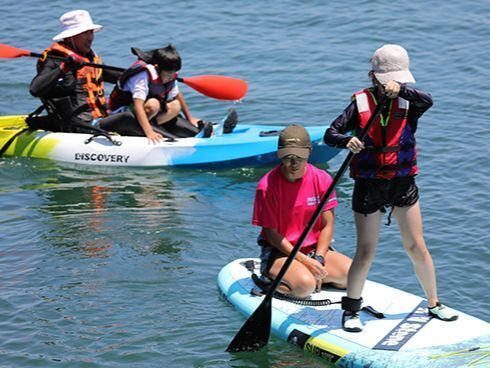 港の中を一時使用して「サップ・カヤックで海遊び」イベントを実施