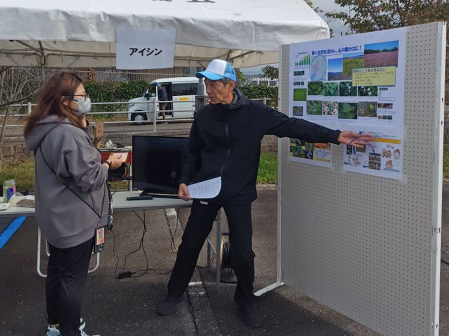 第1弾企画の㈱アイシンの後藤氏のブース