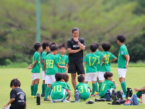 サッカーコーチの様子